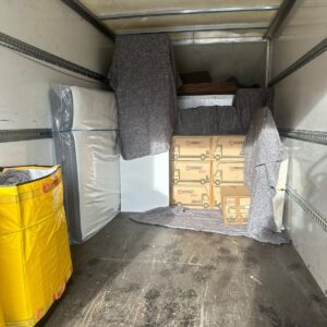eBay & flat-pack delivery — cabinet and boxes loaded for London delivery