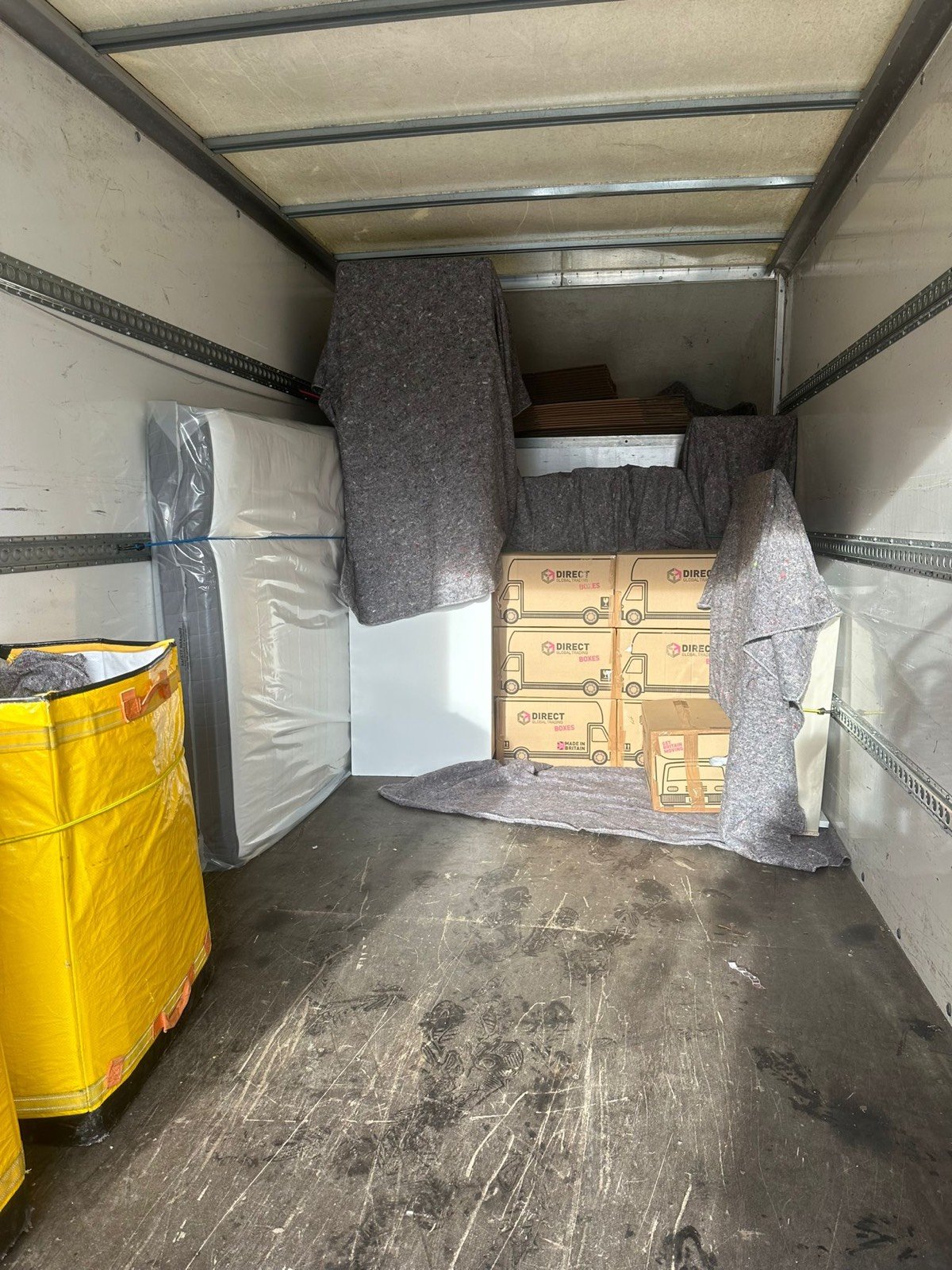 eBay & flat-pack delivery — cabinet and boxes loaded for London delivery