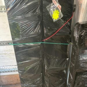 Fragile items wrapped in protective film with FRAGILE tape — Man and Van London