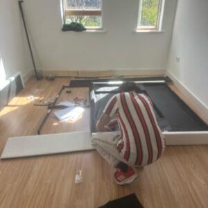Furniture delivery London — newly installed bed and mattress in a London bedroom