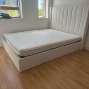 Furniture delivery London — newly installed bed and mattress in a London bedroom