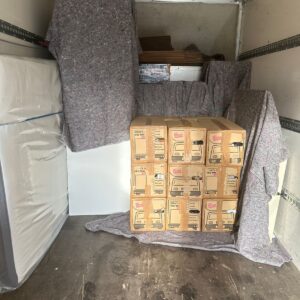 Man and Van London — furniture protected with removal blankets