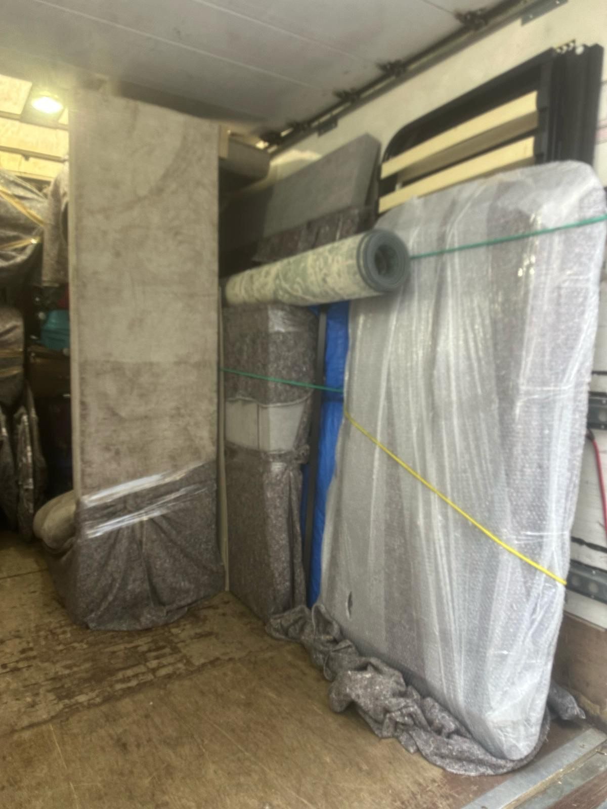 Spacious Man and Van load area lined with removal blankets — London