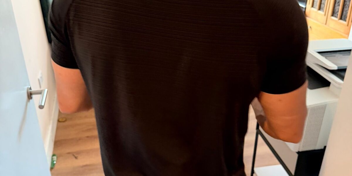Professional packing service — mover wrapping furniture in London