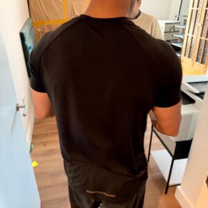 Professional packing service — mover wrapping furniture in London