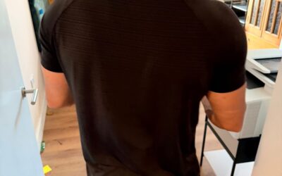Professional packing service — mover wrapping furniture in London
