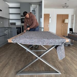 Single-item sofa delivery — sofa professionally blanket-wrapped on site