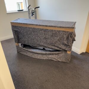 Single-item sofa delivery — sofa professionally blanket-wrapped on site