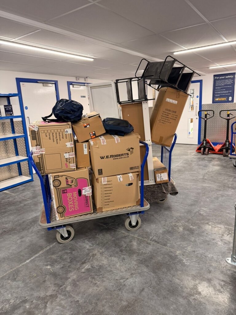 Self-storage solution London — boxes on trolleys at a secure storage facility