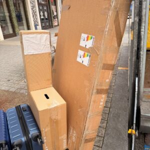 Self-storage solution London — boxes on trolleys at a secure storage facility