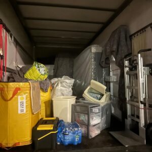 Student move London — bags, drawers and water packs loaded for student relocation