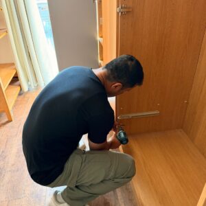 Furniture assembly service in London — wardrobe being assembled with power drill