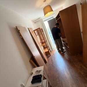 Furniture assembly service in London — wardrobe being assembled with power drill