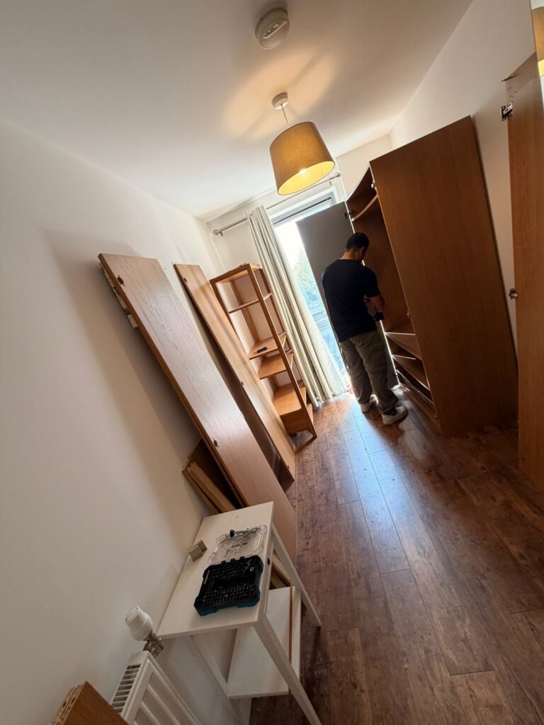Furniture assembly service in London — wardrobe being assembled with power drill