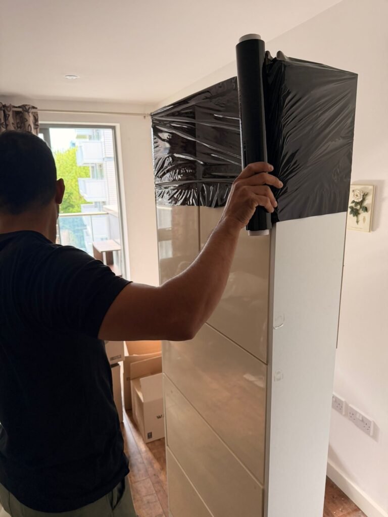 Furniture assembly service in London — wardrobe being assembled with power drill